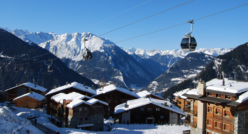 The cable car is coming up from La Chable in the valley below